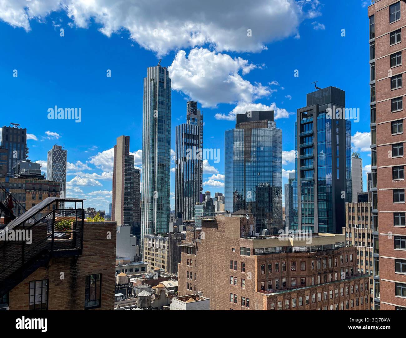 View of Manhattan Midtown skyline from a luxury co-op apartment roof deck in Murray Hill historic district, 2025, New York City, United States - Smartphone Captured Stock Image