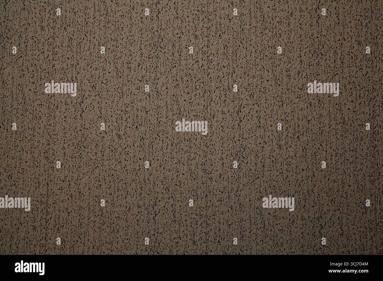 Vertical pattern dotted textured brown wall Stock Photo