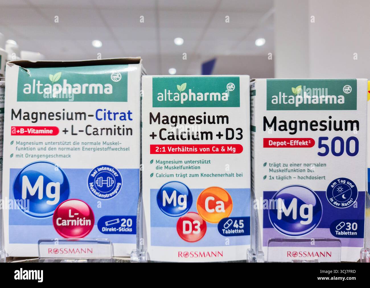 Kiel, Germany - 02. September 2025: Packages of altapharma magnesium citrate,  magnesium calcium D3, and magnesium 500 supplements arranged on a shelf  Stock Photo
