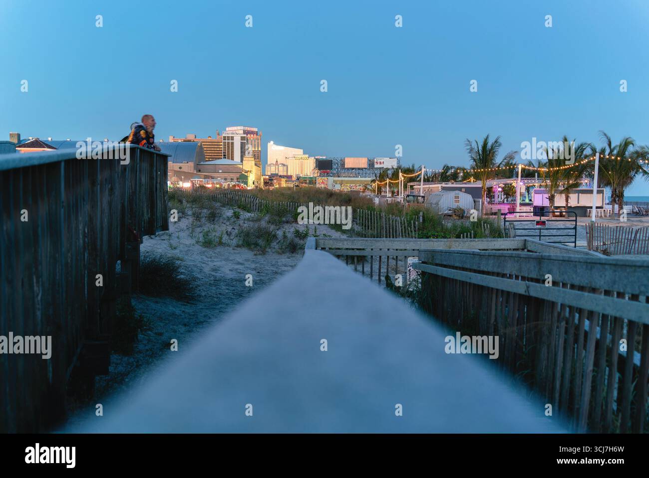 Atlantic City, NJ - Aug 27, 2025: Night oceanfront view of Atlantic City Boardwalk Are a with Bally's, Ocean, Resorts and Hard Rock Towers in backgrou Stock Photo