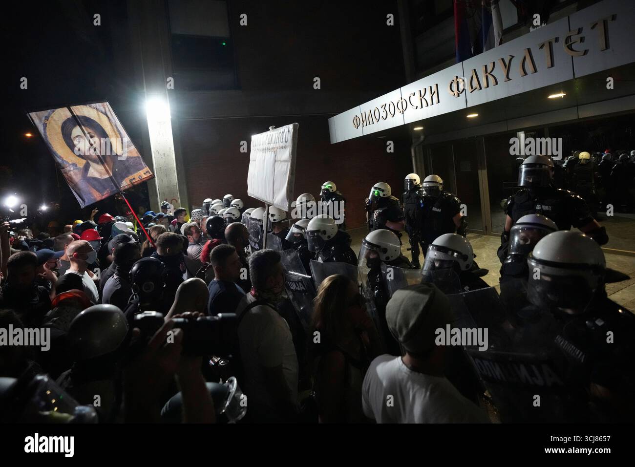 Serbian riot police guard Faculty of Philosophy during a protest ...