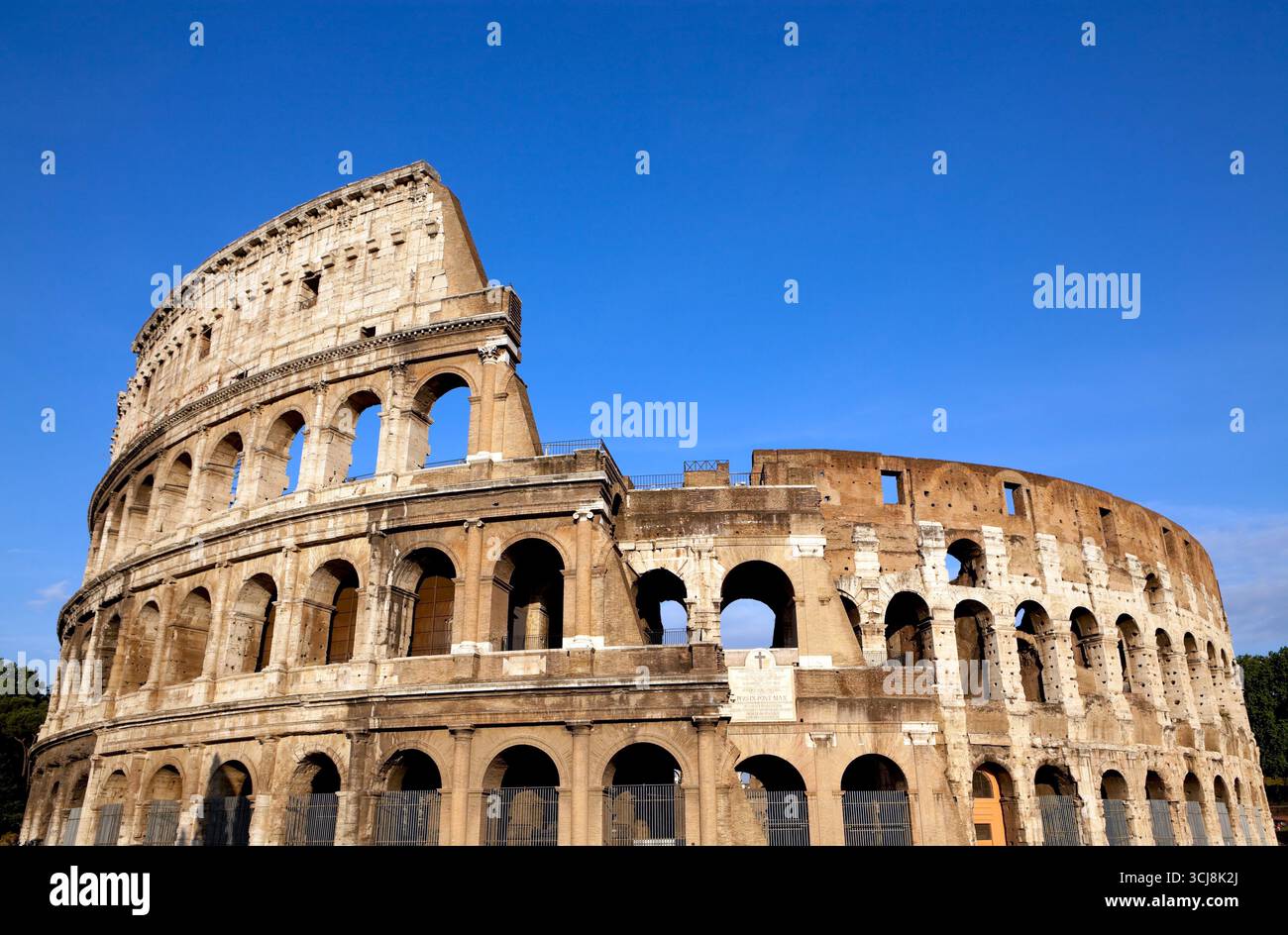 The iconic Colosseum stands majestically in Rome, Italy revealing its ...
