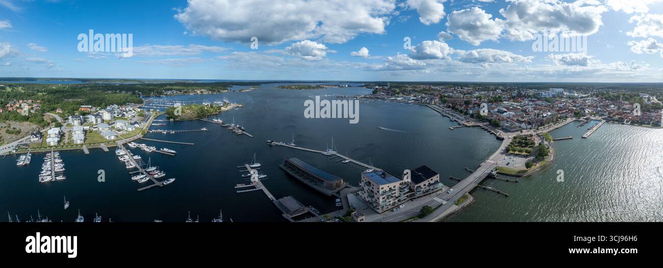 Västervik: A breathtaking aerial view of the Swedish archipelago, city, and coastline, revealing a harbor, islands, and verdant land Stock Photo