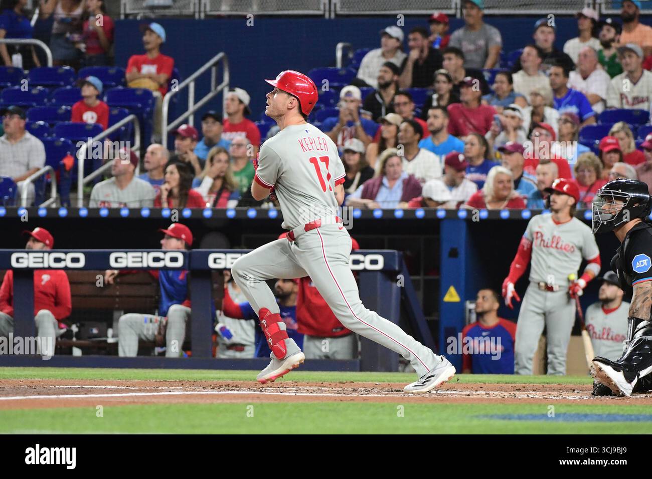 Philadelphia Phillies left fielder Max Kepler (17) watches his homerun ...