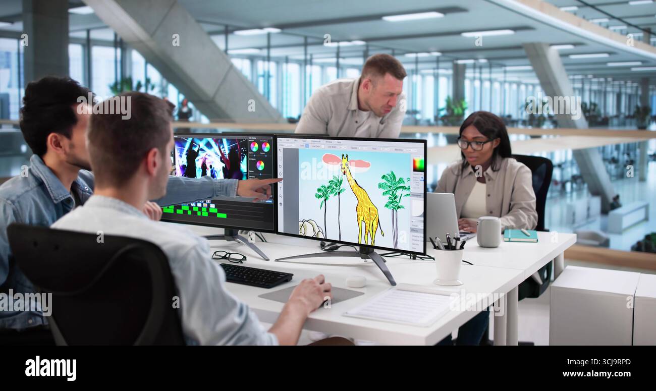 Multiracial Team Of Graphic Designers Editing Print Designs On Computers Stock Photo