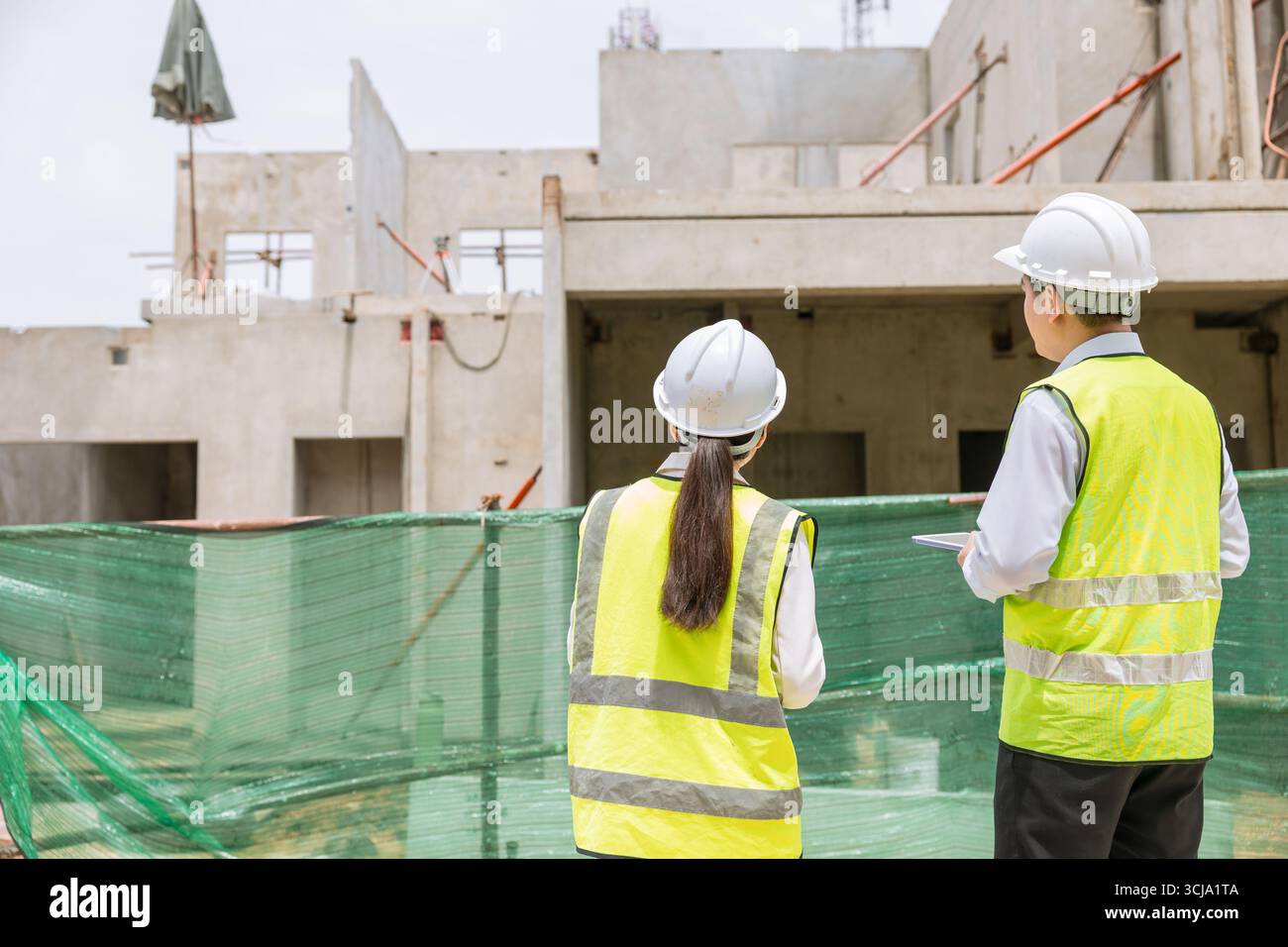 Construction engineer builder working team, Lead architect manager site inspection house construction project assessment process Stock Photo