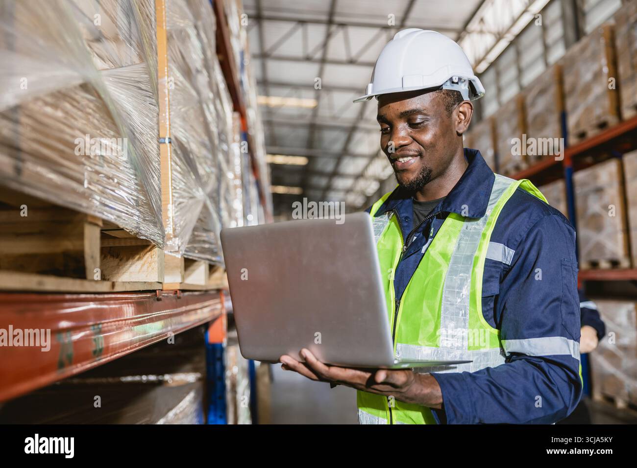 african black professional warehouse worker. stock inventory staff ...