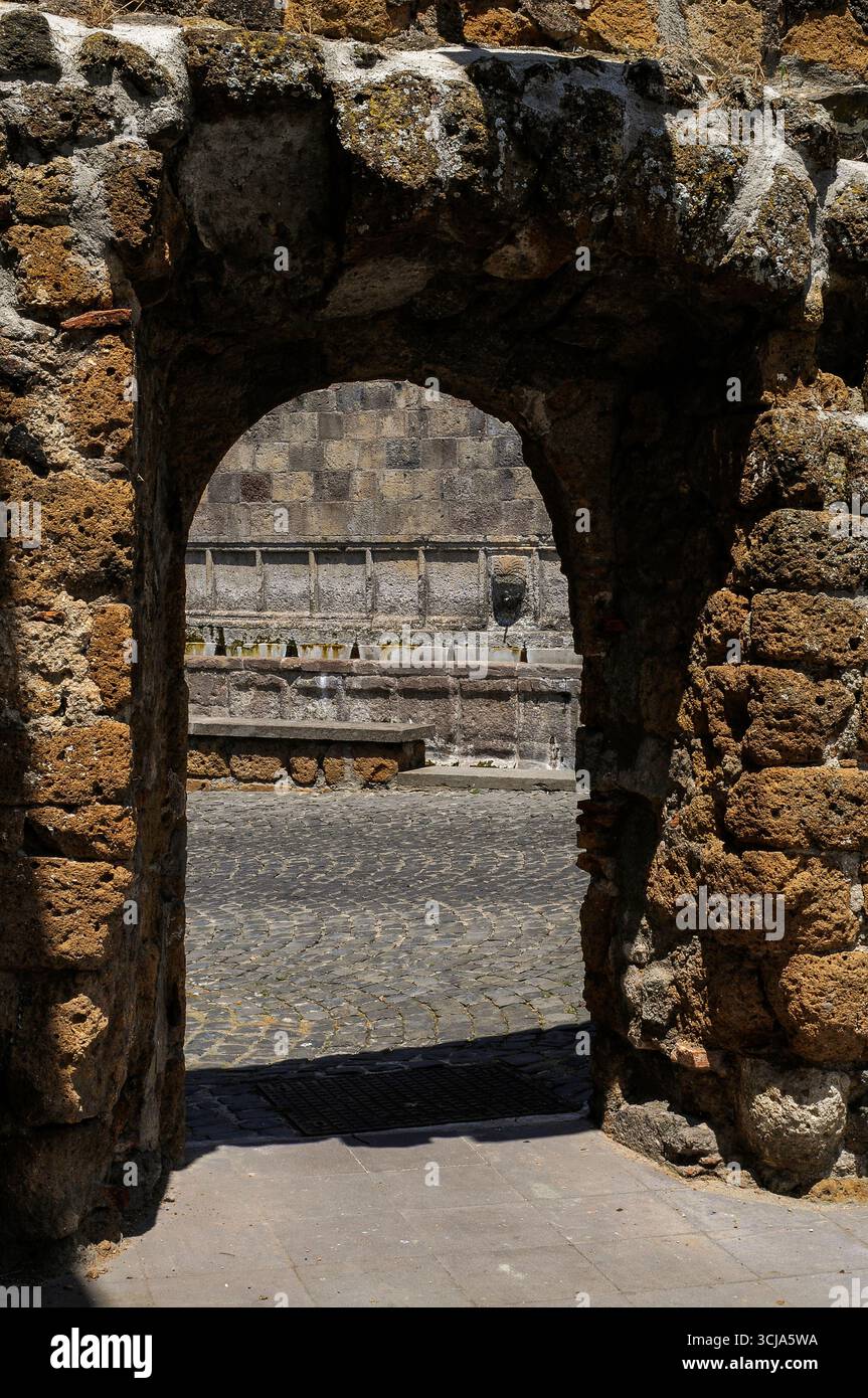 Roman Matrials Ancient tufa archway offers glimpse of oldest fountain in Tuscania ...