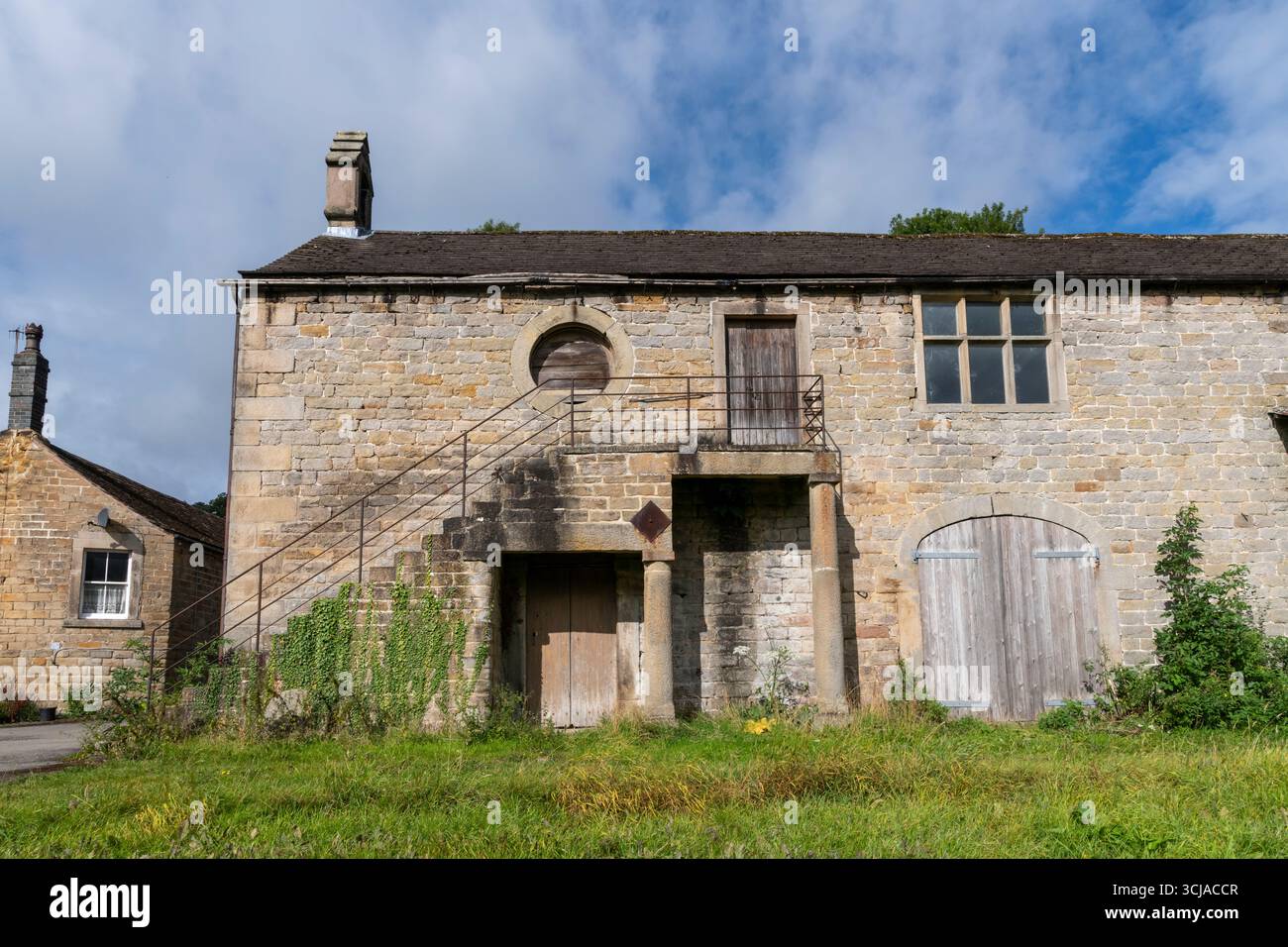 Old stone barn at Stocking farm in the village of Calver once used as a place of worship and a school. Derbyshire, England. Stock Photo