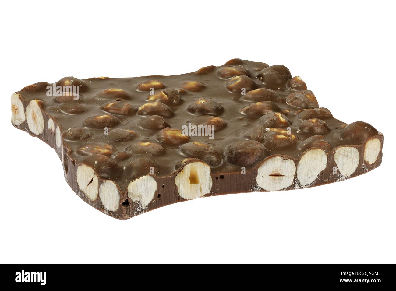 handmade broken chocolate with hazelnuts isolated on white background Stock Photo