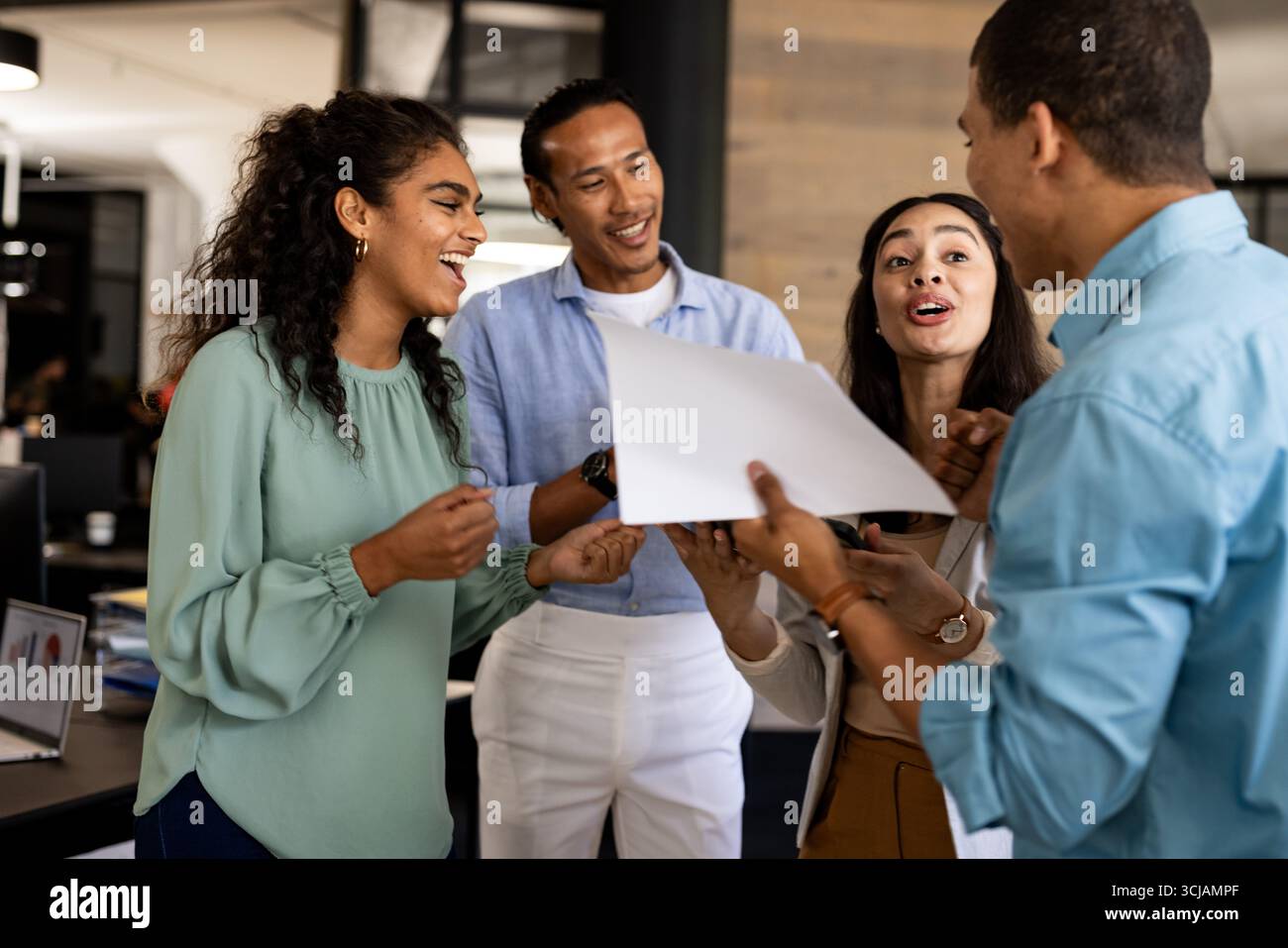 Diverse business team discussing project and sharing ideas in modern ...
