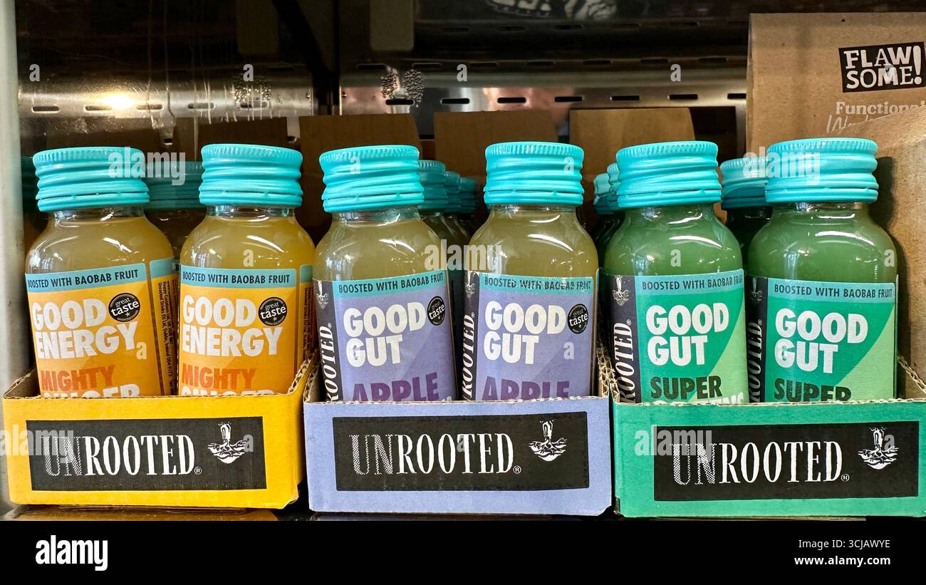 Small bottles of drinks (shots) by the brand Unrooted - Smartphone Captured Stock Image