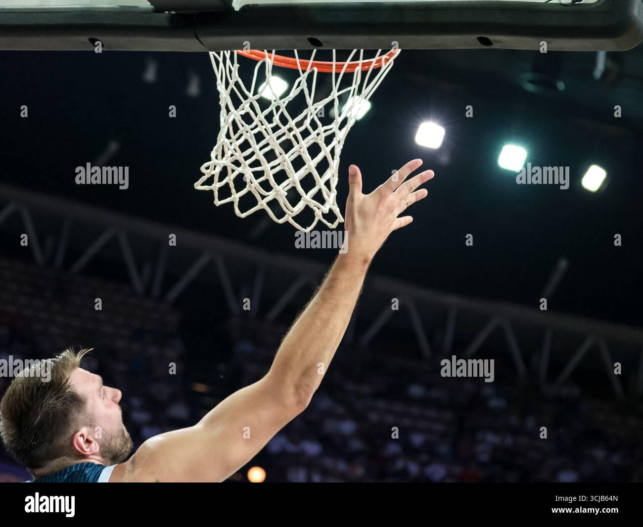 Luka Doncic of Slovenia scores points during the Group D FIBA ...