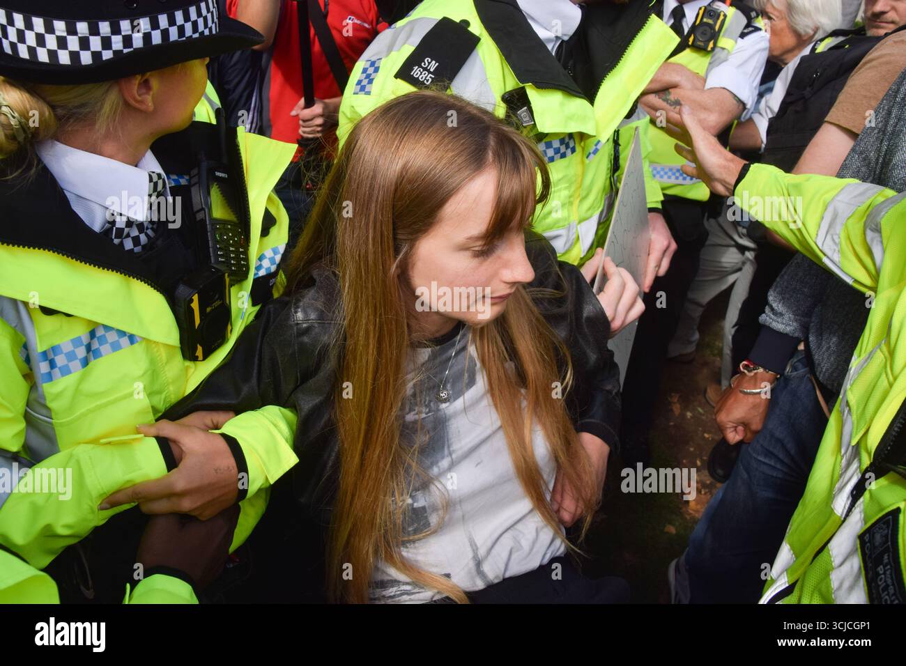 Female police officer arresting woman hi-res stock photography and ...