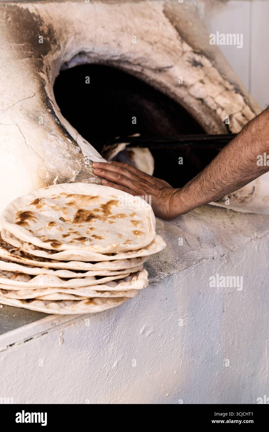 Baker prepares traditional middle hi-res stock photography and images ...