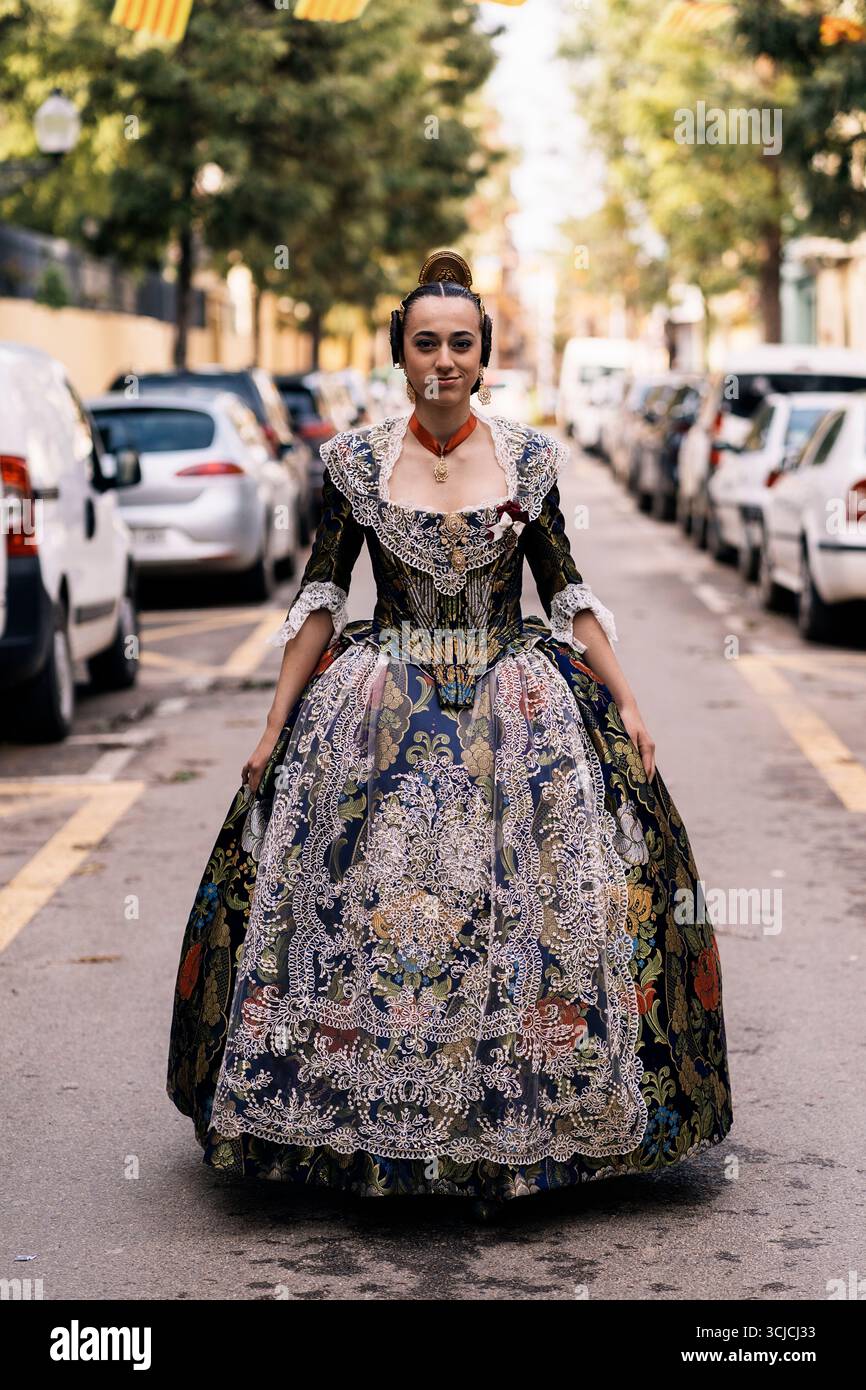 Woman in traditional attire confidently hi-res stock photography and ...