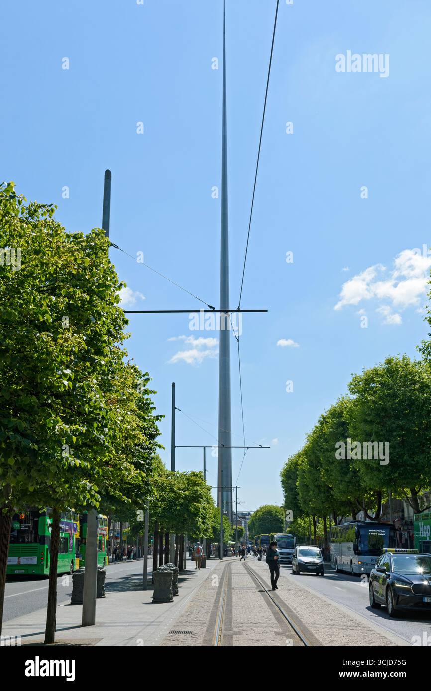 The Spire from the tram tracks on O'Connell Street, Dublin, Ireland. Stock Photo