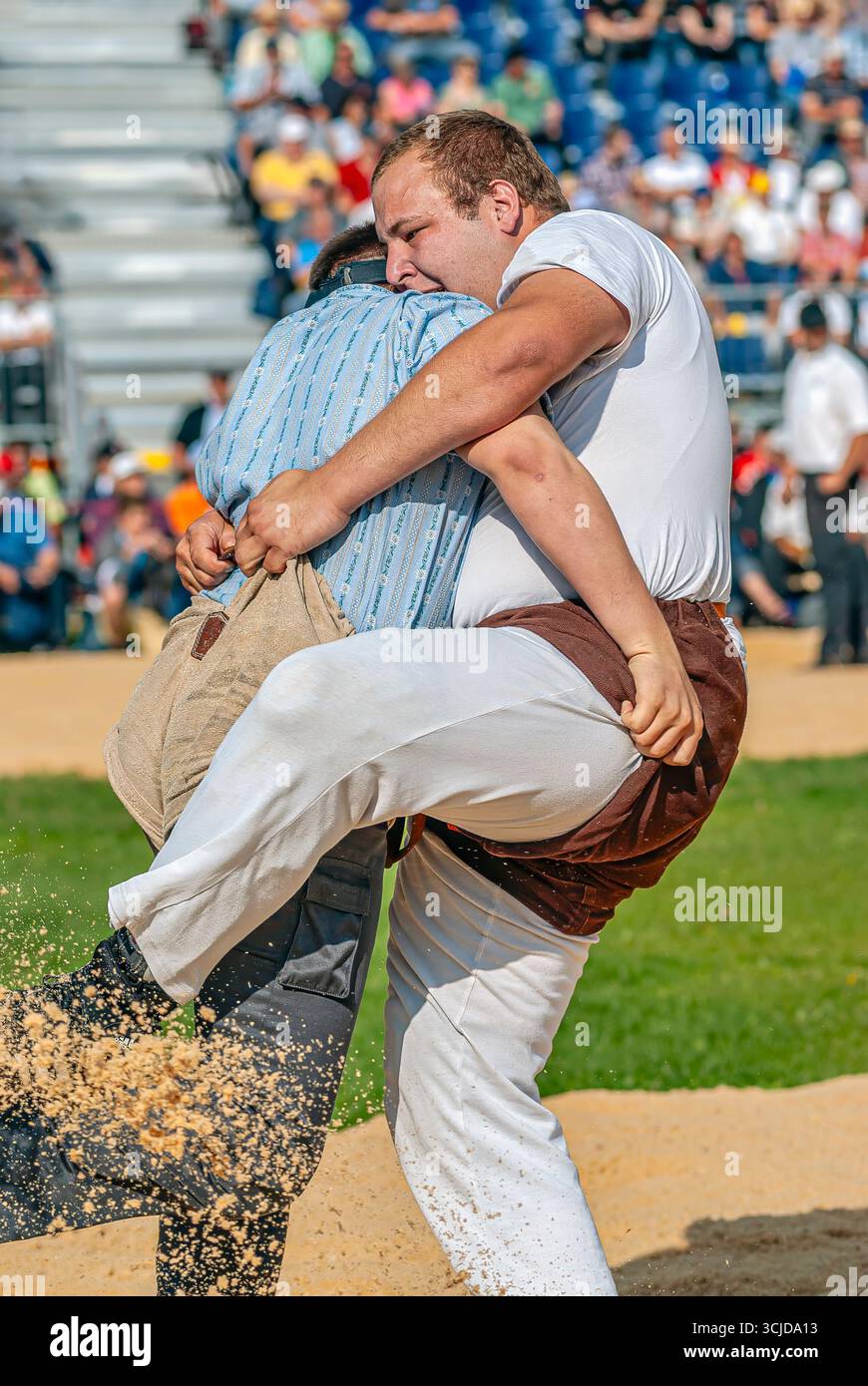 Swiss wrestlers fighting at the NOS 2012 in Silvaplana, Switzerland Stock Photo
