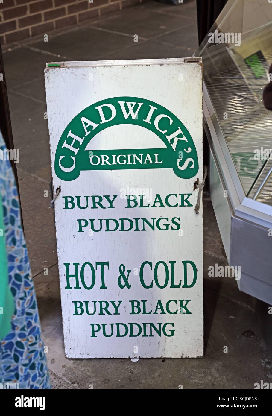 Sign outside Chadwick’s stall advertising original Bury black puddings inside Bury Market, Bury, Greater Manchester, England, UK. Chadwick Stock Photo