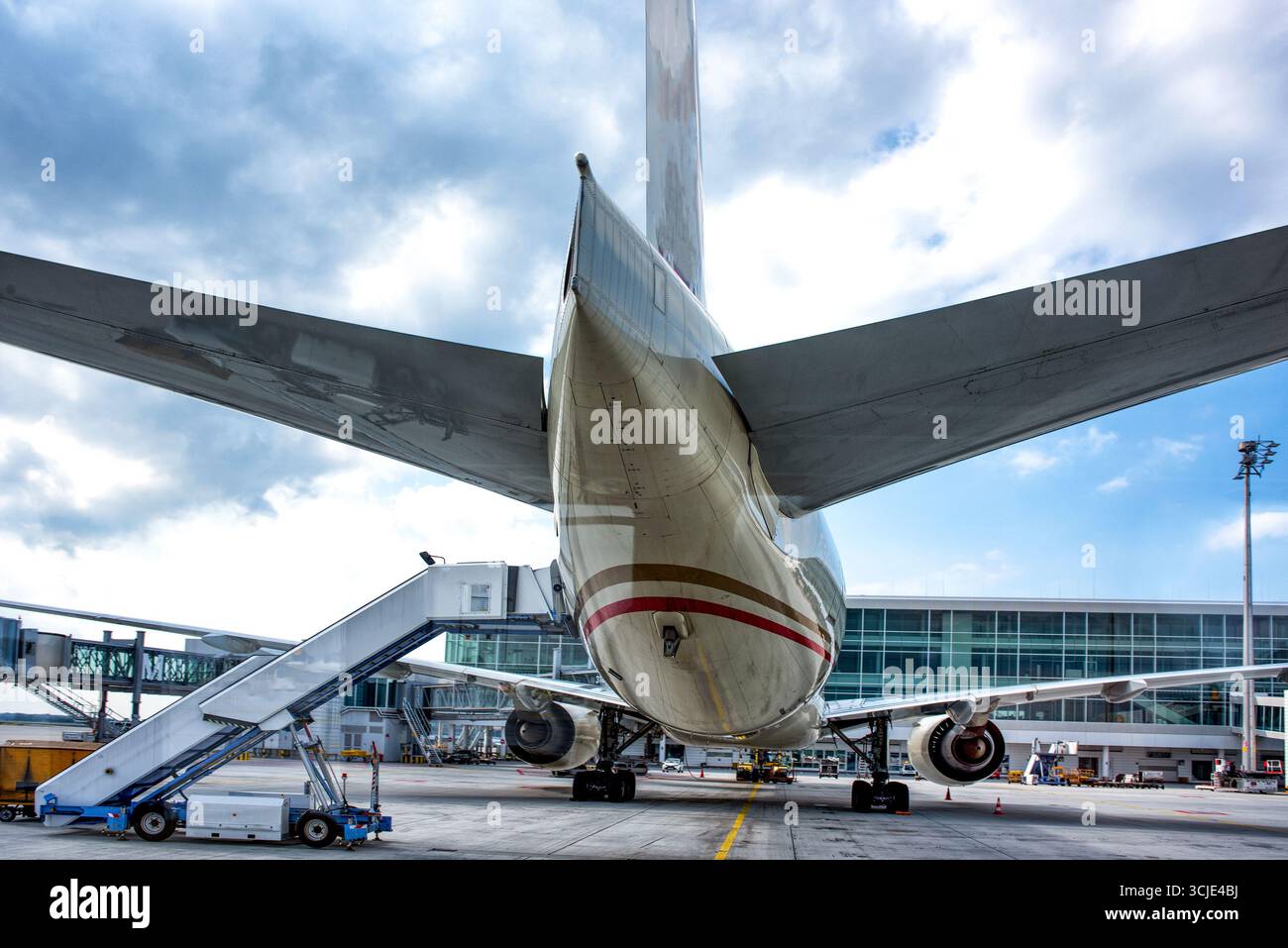 Loading of big aeroplane at airport. Stock Photo