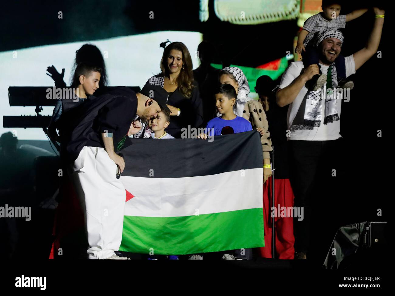 Puerto Rican rapper Residente welcomes members of the Palestinian ...