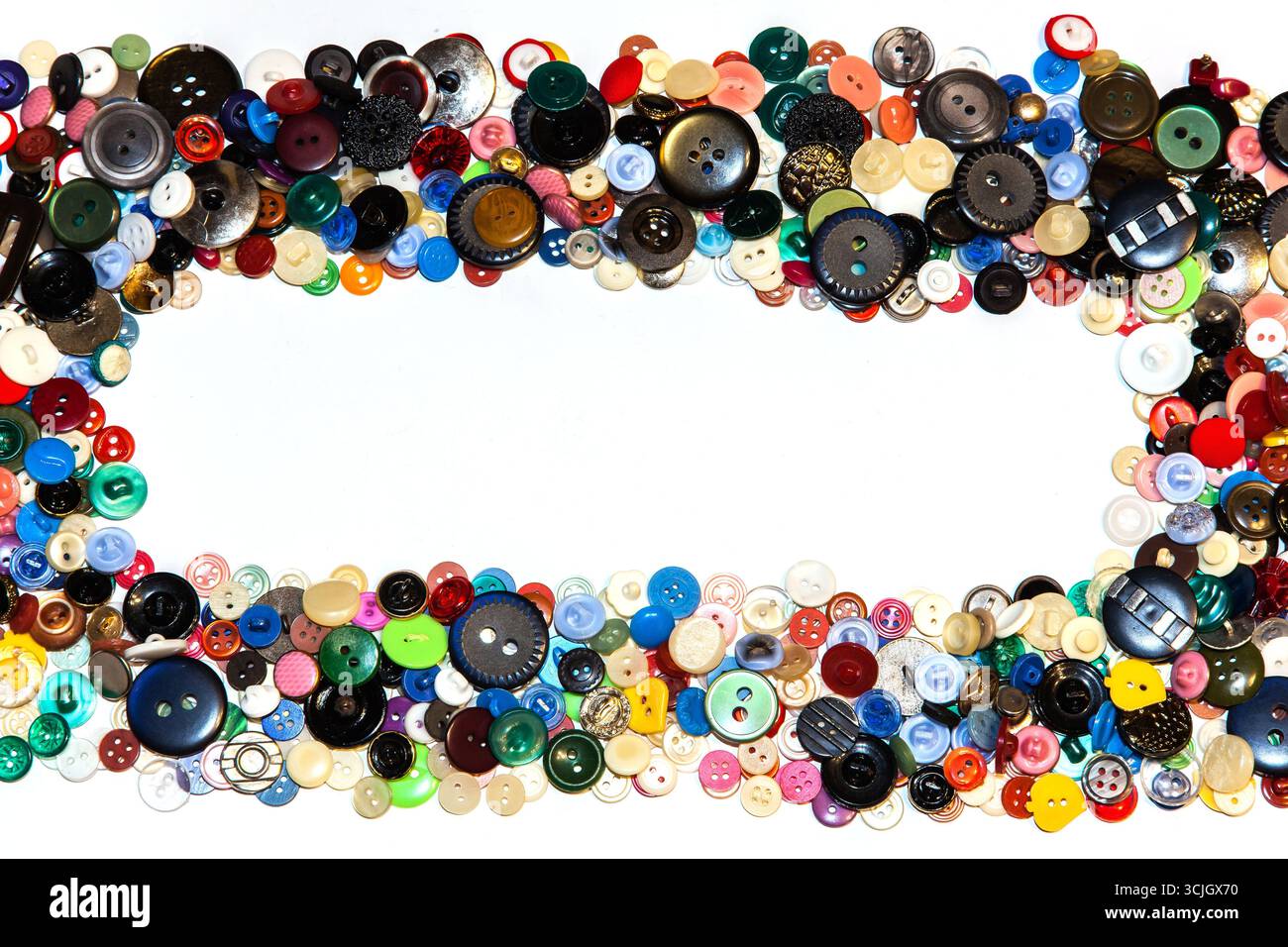Multi-colored buttons on a white background close-up. Stock Photo