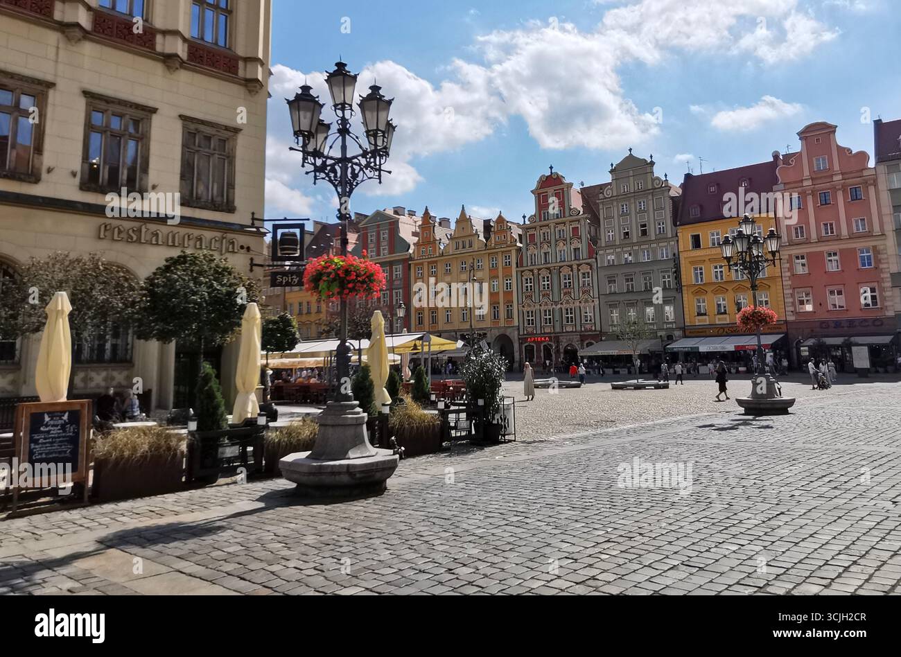 Wrocław Rynek, Poland—historic Old Town Square with colorful facades, cobblestone streets, summer light, and vibrant architecture in Lower Silesia. - Smartphone Captured Stock Image