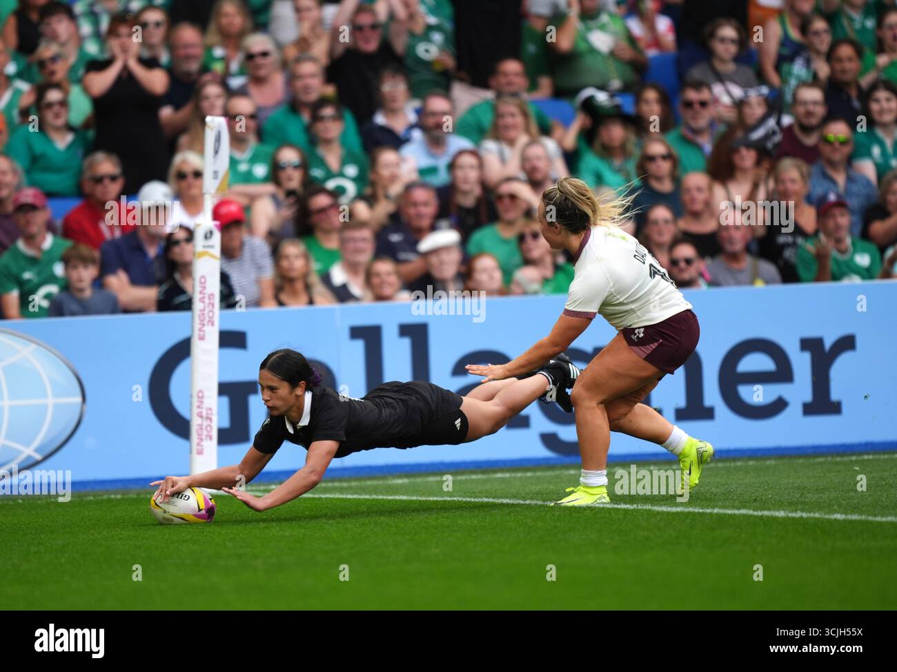 New Zealand's Braxton Sorensen-McGee scores their side's fourth try of ...