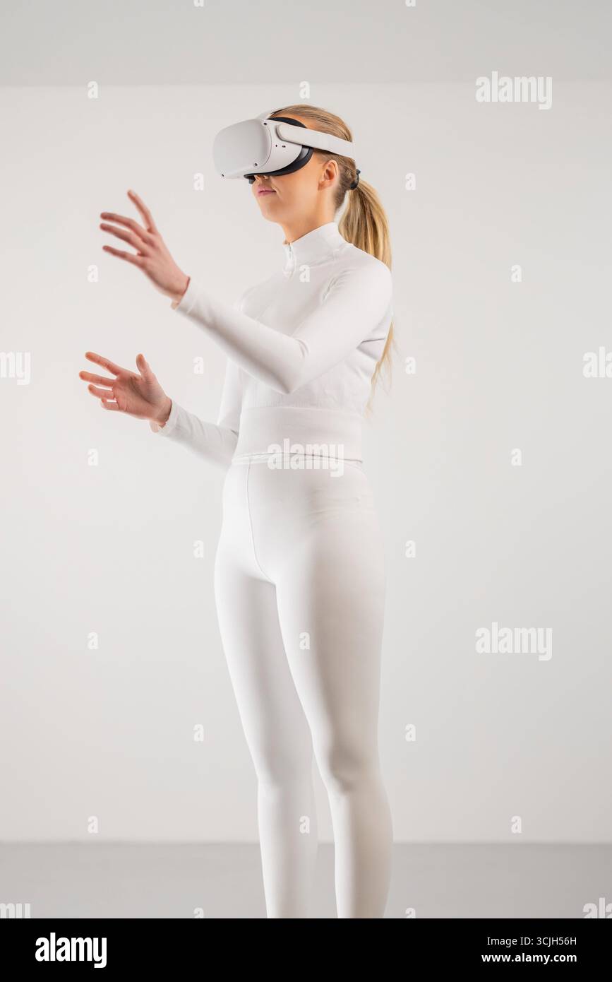Woman Using Virtual Reality Headset Stock Photo
