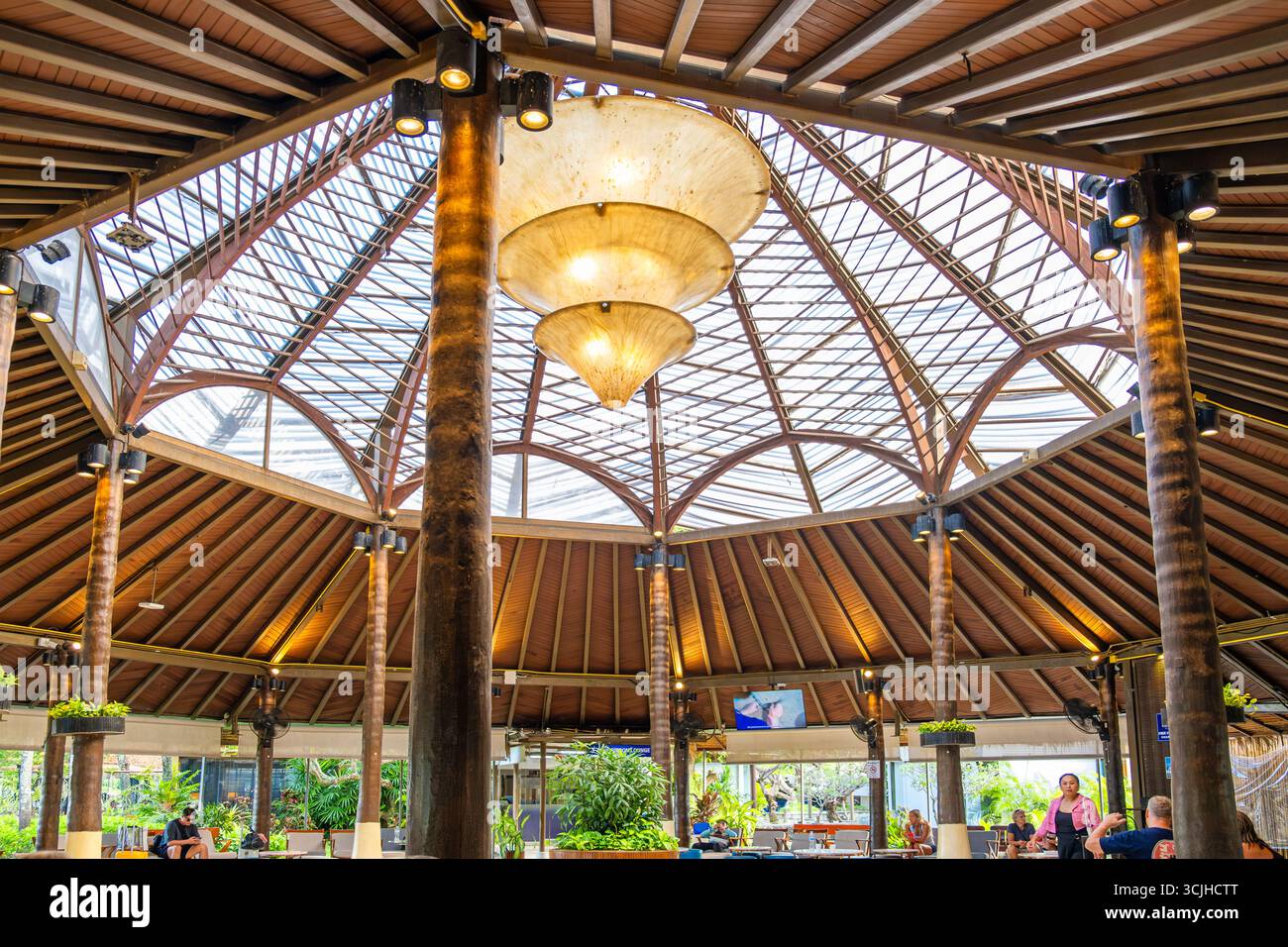 Samui, Thailand - March 3, 2025 : Interior of Samui airport departure terminal featuring tropical style wooden dome ceiling and relaxed waiting area Stock Photo