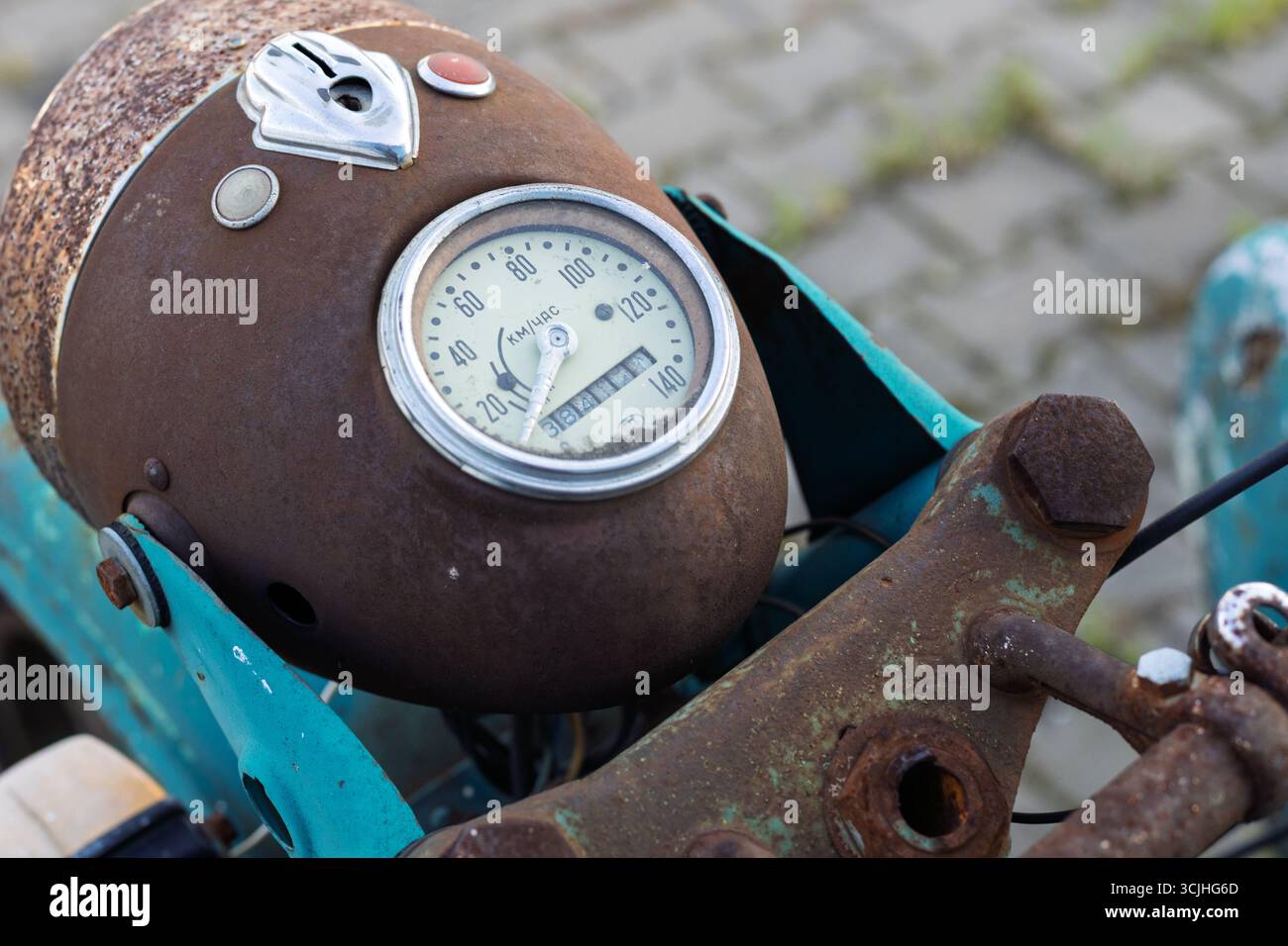Wroclaw, Poland - August 28 2025: Rusted Soviet motorcycle speedometer close-up Stock Photo