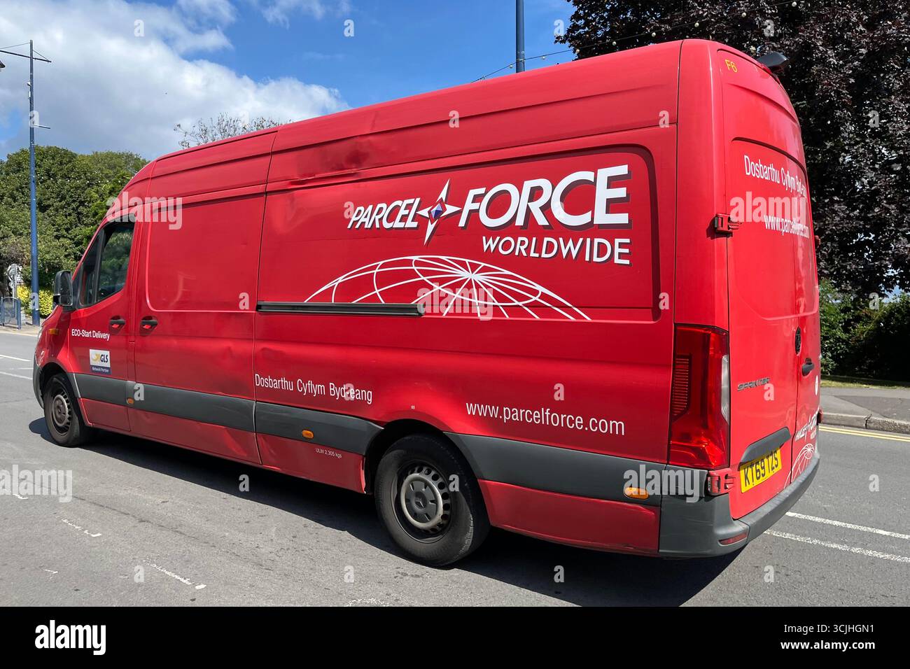 Parcelforce Worldwide Delivery Van driving through Mumbles, Swansea, Wales, United Kingdom. 22nd August 2025. - Smartphone Captured Stock Image