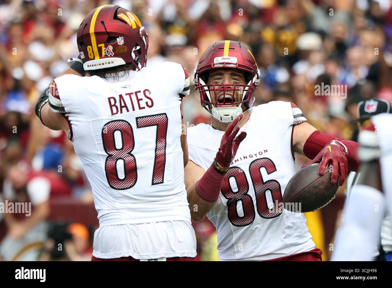 Washington Commanders tight end Zach Ertz (86) celebrates with ...