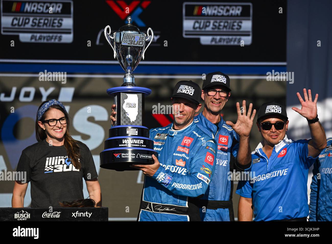 Madison I'll Raceway Denny Hamlin, second from left, celebrates after winning a NASCAR Cup ...