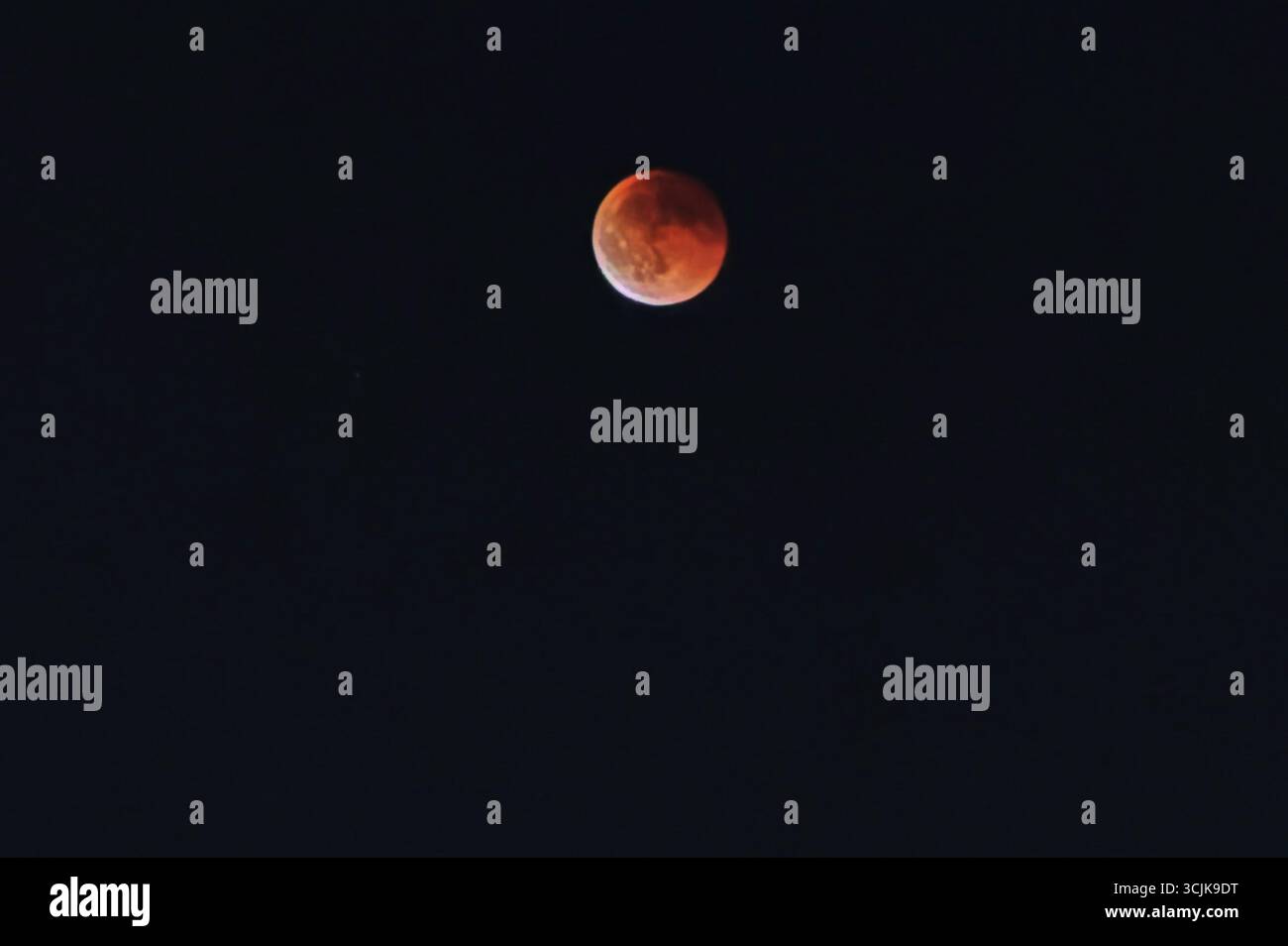 The moon turns red during a total lunar eclipse in Cairo In Egypt, on ...