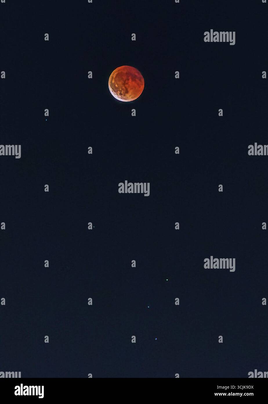 The moon turns red during a total lunar eclipse in Cairo In Egypt, on ...