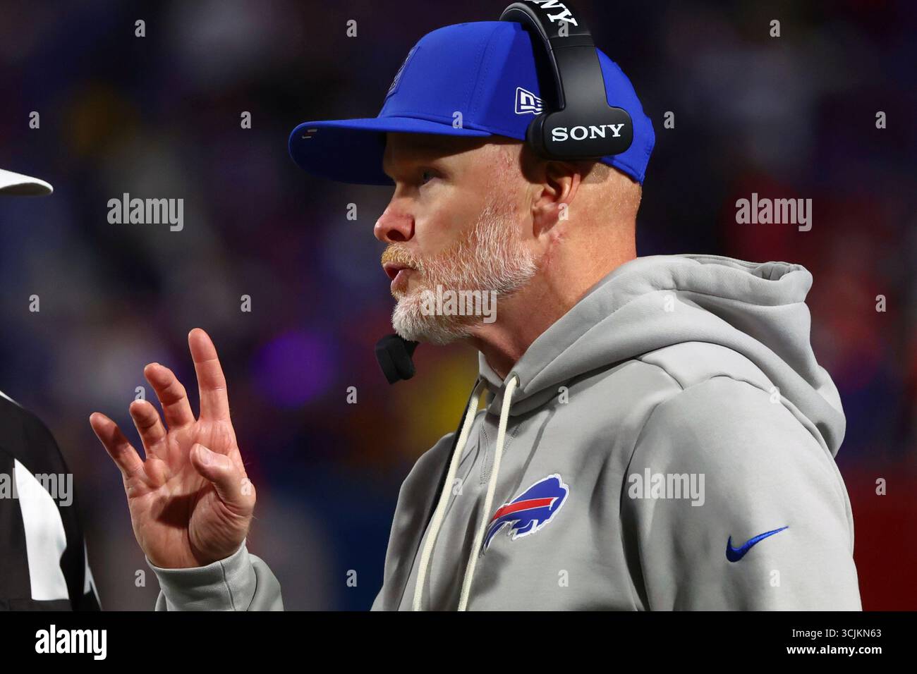 Buffalo Bill head coach Sean McDermott talks with an official during