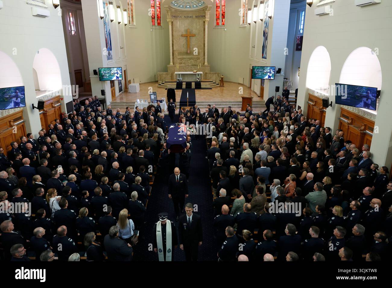 A general view of departure during the funeral service for Detective ...