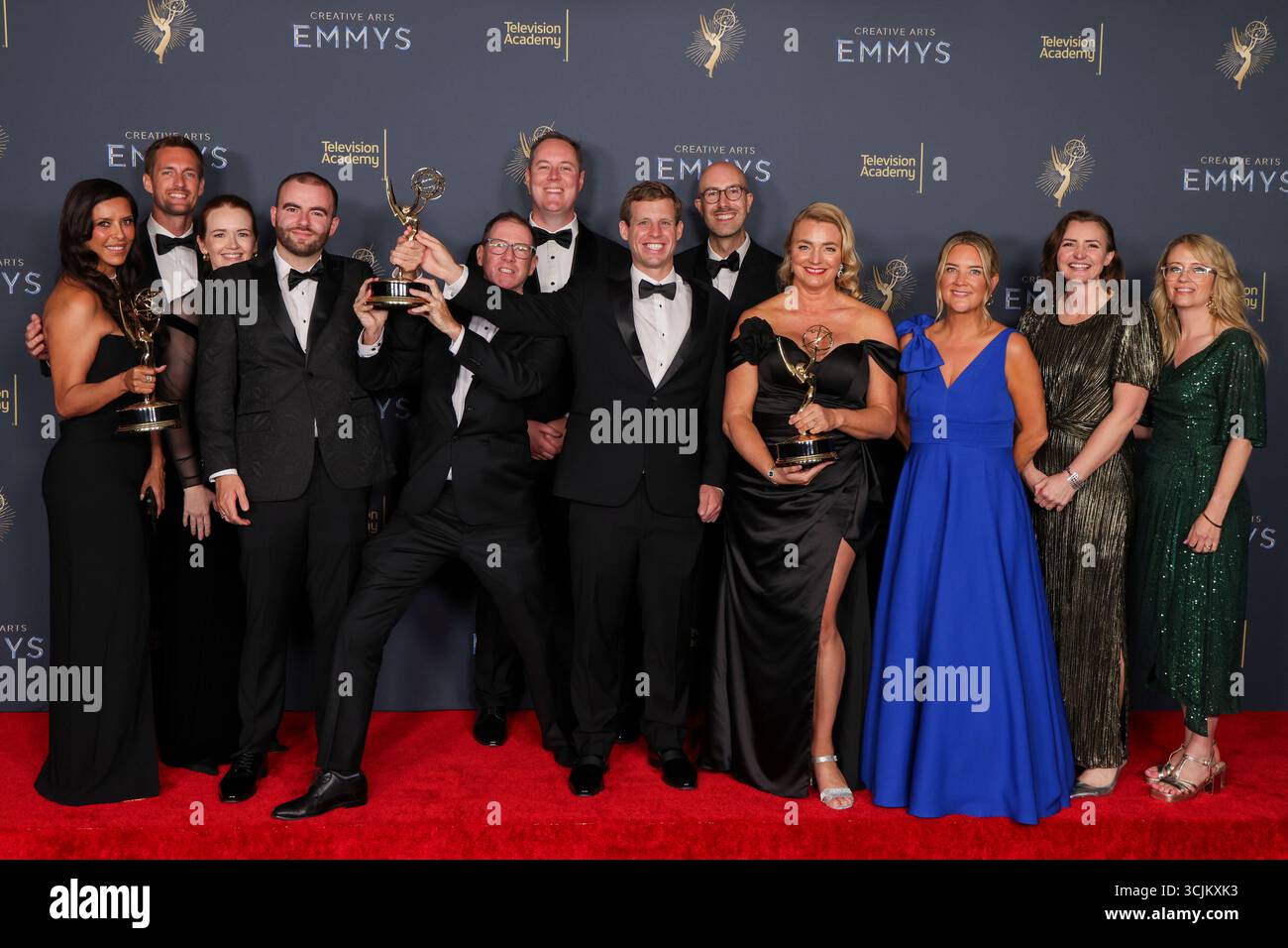 The team from "Love On The Spectrum" with their Emmy for with their(00)