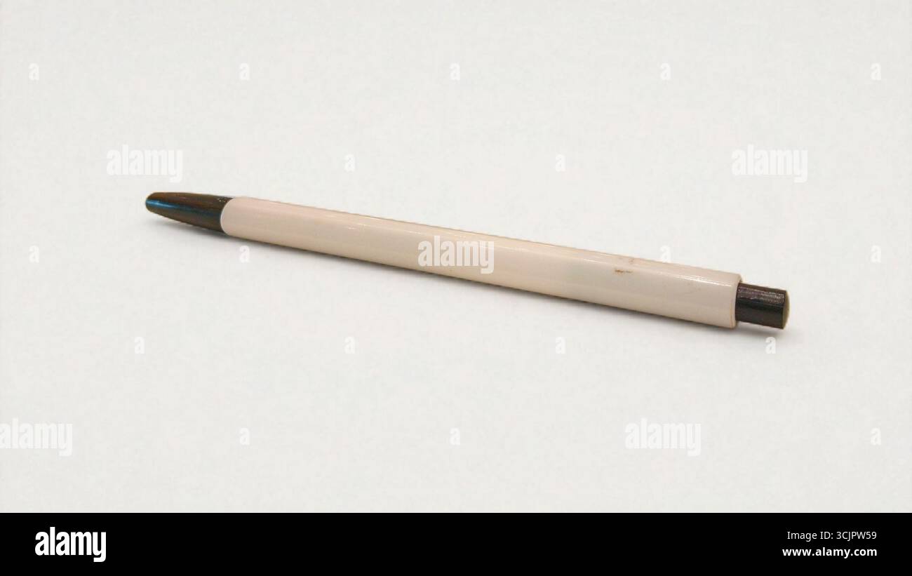 A ballpoint pen on a white table Stock Photo