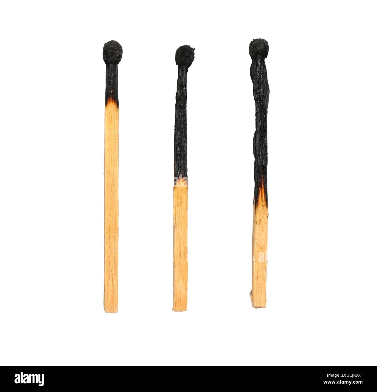 Three burned wooden matches isolated on white, clipping path Stock Photo