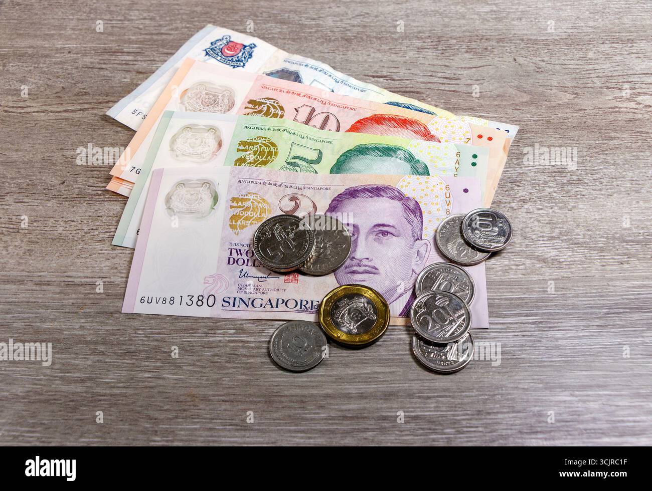 Singapore currency notes hi-res stock photography and images - Alamy