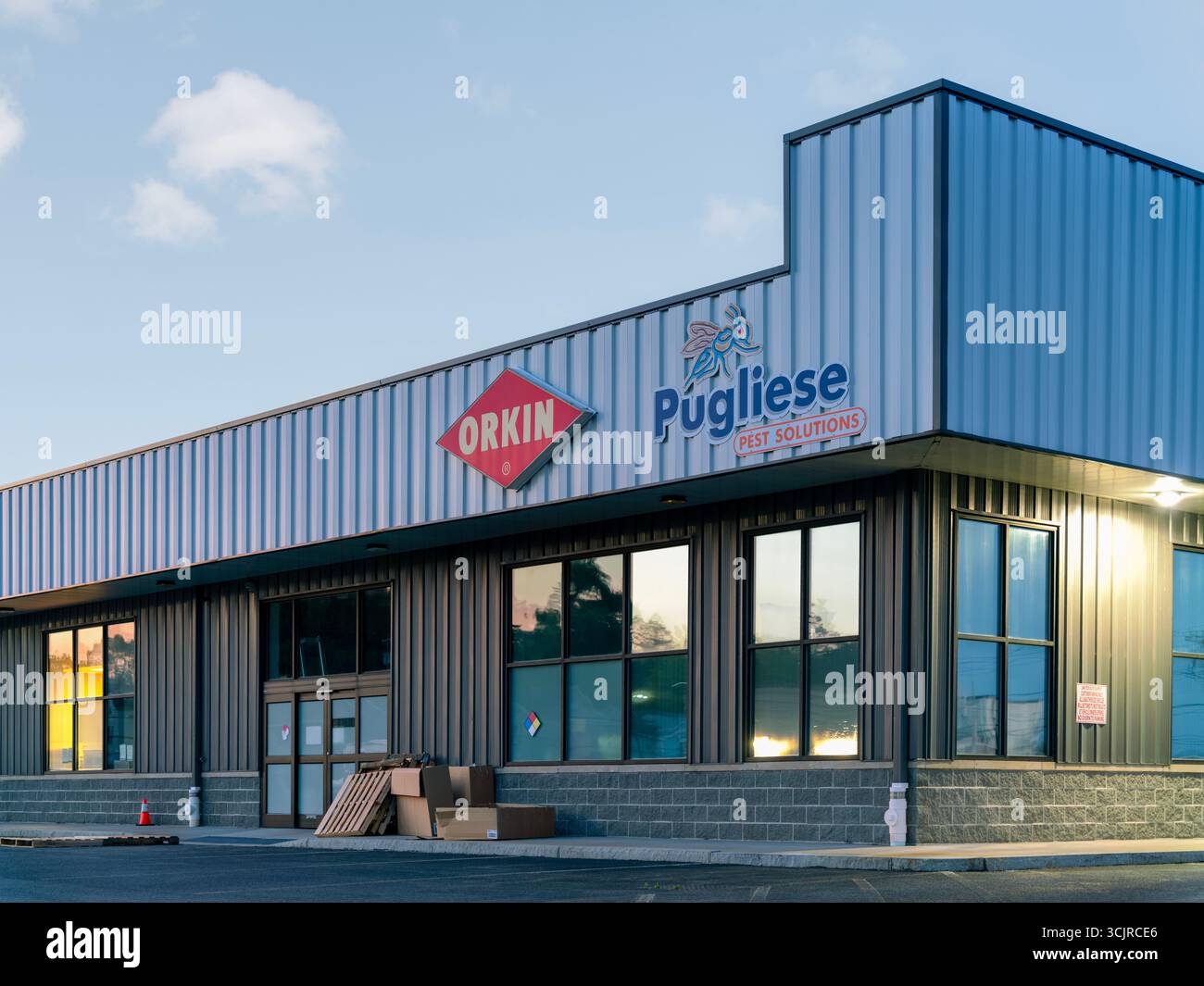 Utica, NY - Aug 16, 2025: Night view of Orkin, is an American pest ...