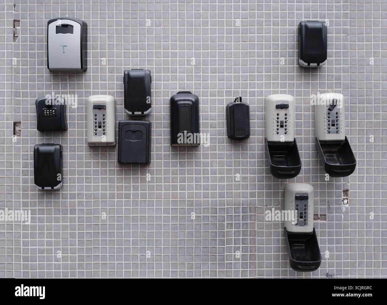 Multiple Key Lock Boxes Mounted On Outdoor Tiled Wall Used For Secure ...