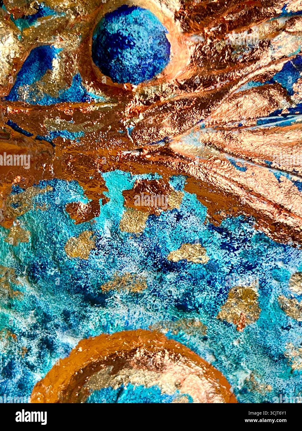 voluminous texture of a papier-mâché vase, blue color, abstract background, with gold and bronze potal, detail of a vase for the background - Smartphone Captured Stock Image