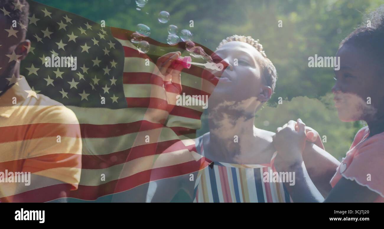 Blowing woman wearing striped top creating soap bubbles at park, with bubble wand and flag overlay Stock Photo