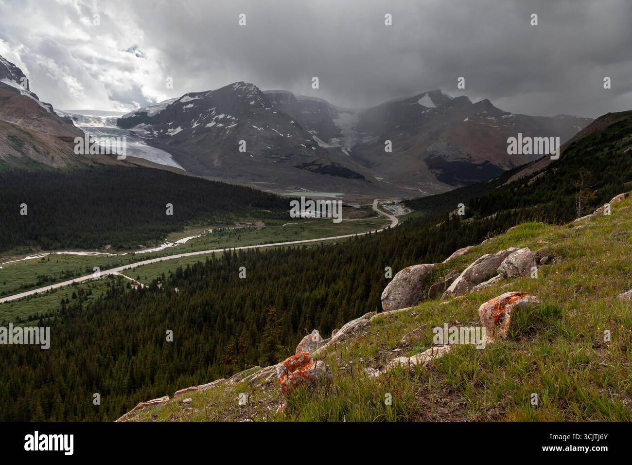 A rainstorm moves in from the west over the Columbia Icefields in Canada's Jasper National Park. The Columbia Icefield is a surviving remnant of the t Stock Photo