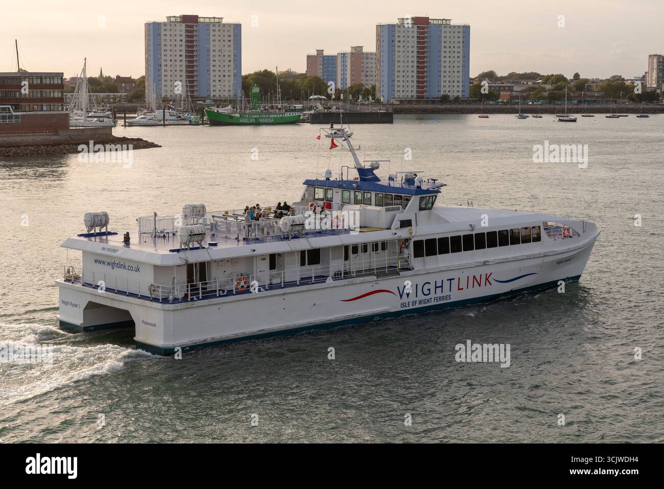 Portsmouth England UK. 05.09.2025. Wight Ryder 1 inbound catararan passenger ferry yo Portsmouth Harbour arriving from Ryde Isle of Wight service Stock Photo