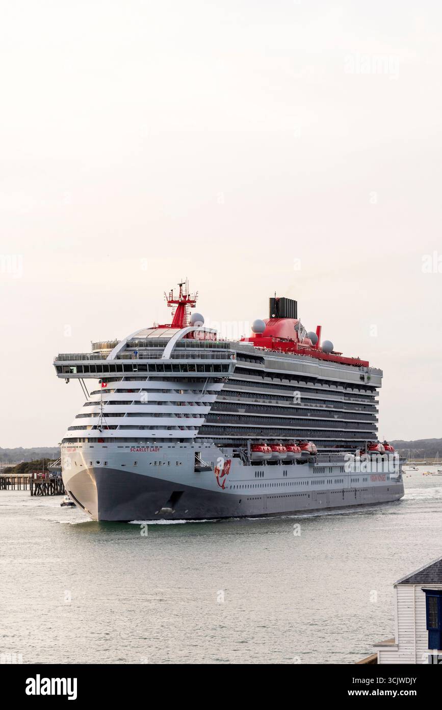 Portsmouth England UK.  The Scarlet Lady cruise ship outbound  on Portsmouth Harbour southern England UK. Stock Photo