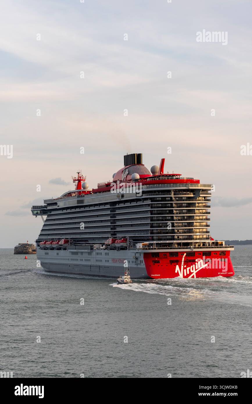 Portsmouth England UK.  The Scarlet Lady cruise ship outbound from Portsmouth southerrn England UK. Stock Photo